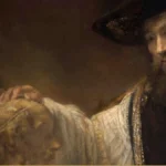 Detail of a Rembrandt painting: a bearded man in a wide black hat and white sleeves rests his hand on a marble bust, shelved books behind him.