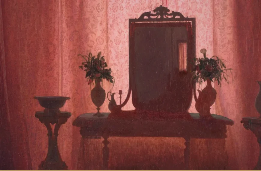 Detail of a nineteenth-century interior: an empty room with a dark mirror on rose patterned wallpaper, flanked by vases of dried flowers.