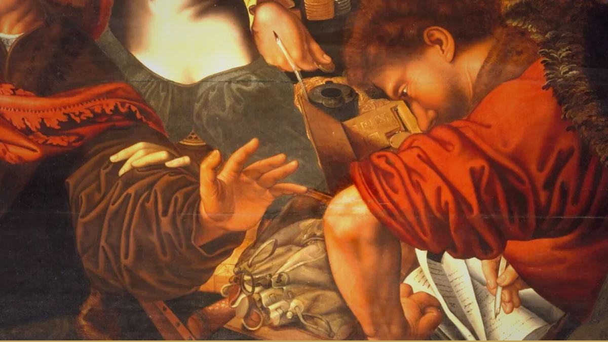 Detail of a Caravaggio painting: a young man in red sleeves bends low over a table, counting with a quill, inkwell and ledger before him.