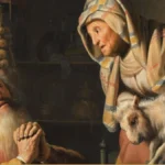 An old woman in a striped headscarf leans in holding a young goat while a white-bearded old man sits with folded hands and looks up at her in a dim room.